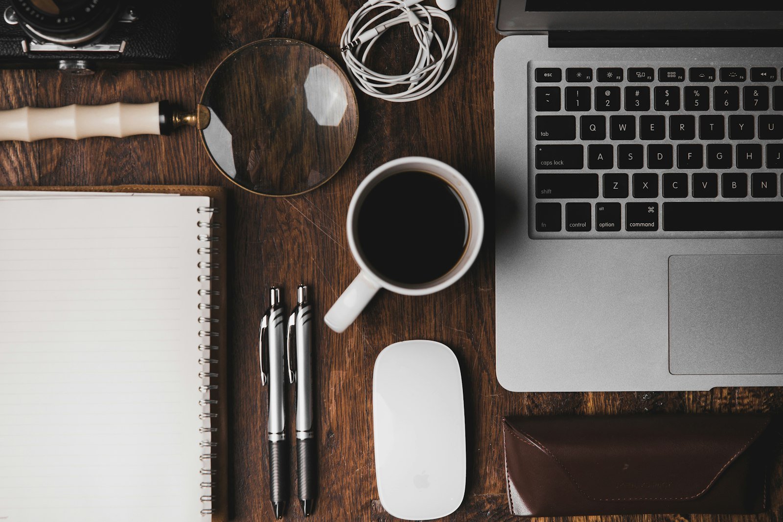 Desk with keyboard and coffee